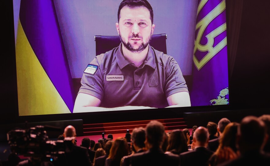 President of Ukraine Volodymyr Zelenskyy speaks via video during the opening of the  Cannes film festival on Tuesday.
