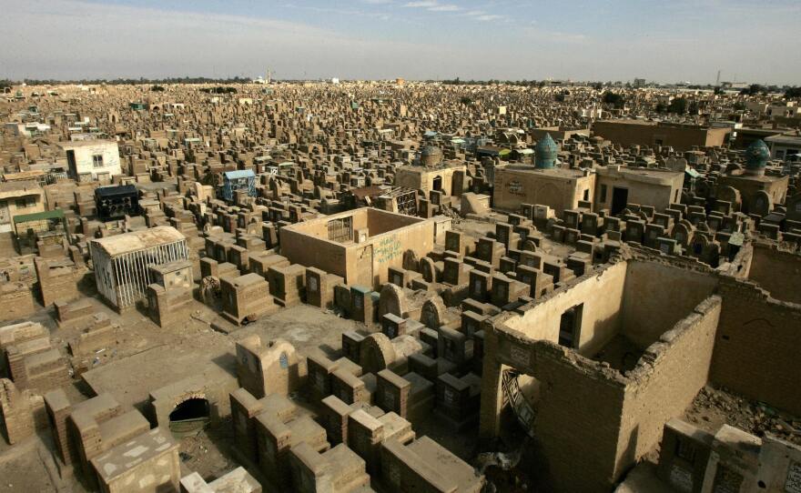 The Valley of Peace in Najaf, where millions of Shiite Muslims are buried, is one of the largest cemeteries in the world. The crowded cemetery is preparing to receive more burials, as Shiite volunteers fight and die in Iraq's ongoing conflict.