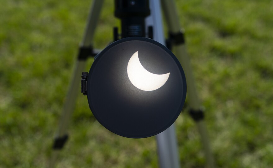 A telescope projects the solar eclipse on a filter on Monday, April 8, 2024, at the Ste. Genevieve County Community Center in Ste. Genevieve.