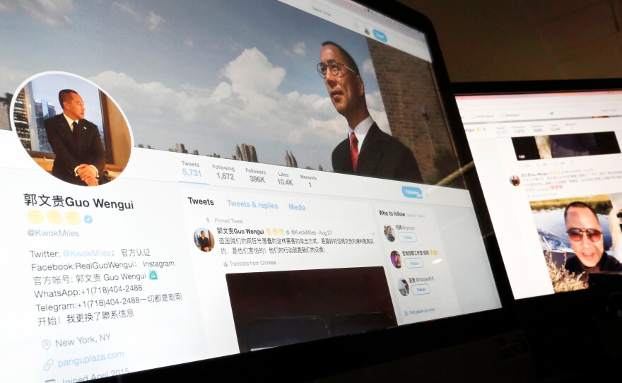 FILE - A Twitter page of Chinese exiled businessman Guo Wengui is seen on a computer screen in Beijing, Aug. 30, 2017.