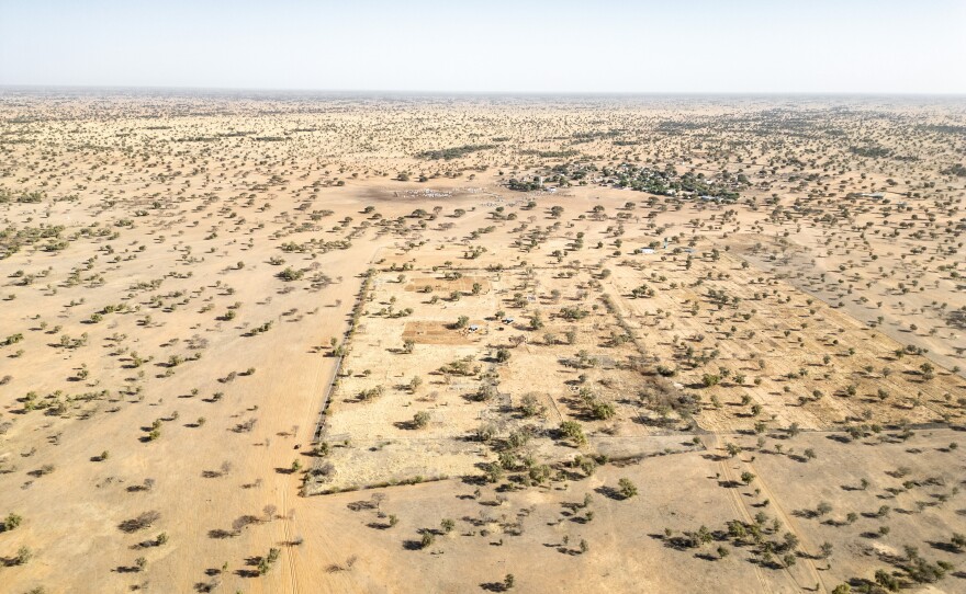 An aerial view of a farm run by Senegal's Great Green Wall agency outside Widou Thiengoly in the Ferlo Desert. The farm failed at first and has now been resurrected.
