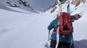 A skier ascending in Jackson, Wyo., in February. The Veterans COMPACT Act of 2020 requires the Department of Veteran Affairs to investigate outdoor recreation as a recognized form of therapy.