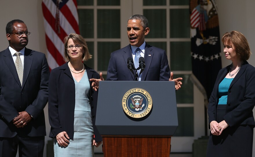 President Obama announces  in the White House Rose Garden on Tuesday his nominations of (from left) Robert Wilkins, Cornelia Pillard and Patricia Millett to fill vacancies on the U.S. Court of Appeals for the District of Columbia.