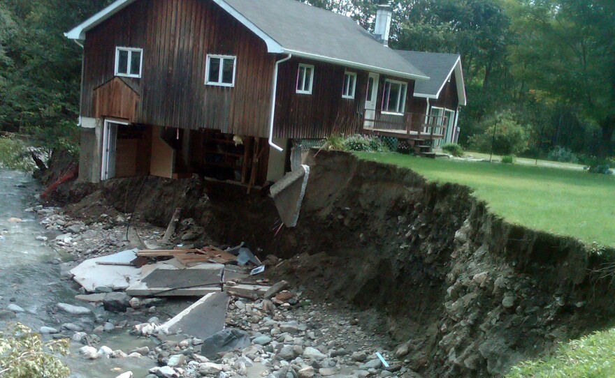 A house sits destroyed by Tropical Storm Irene in Rochester, Vt., on Aug. 31, 2011.