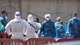Members of the press report from an expected reception point for passengers from the MV Hondius at the Granadilla Port on May 09, 2026 in Tenerife, part of the Canary Islands, Spain.