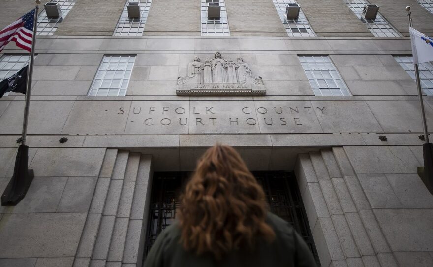 A Massachusetts woman who had an abortion when she was 15 stands outside the Suffolk County Courthouse in Boston. Right now, girls facing that decision who don't want to tell their parents must get a judge's approval.