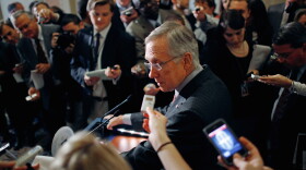 Senate Majority Leader Harry Reid (D-NV) talks with reporters after a Democratic Caucus meeting in the U.S. Capitol December 2, 2010 in Washington, DC.