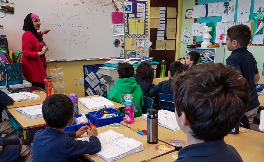 Souad Mohammad teaches Arabic to a third-grade class at Al Fatih Academy in Reston, Va.