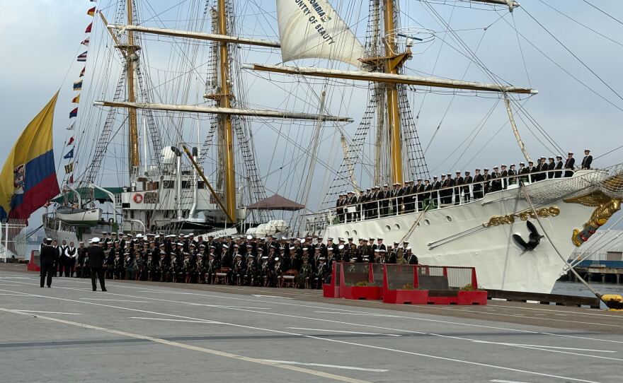 ARC Gloria docks in San Diego Bay with crew standing for a photo.