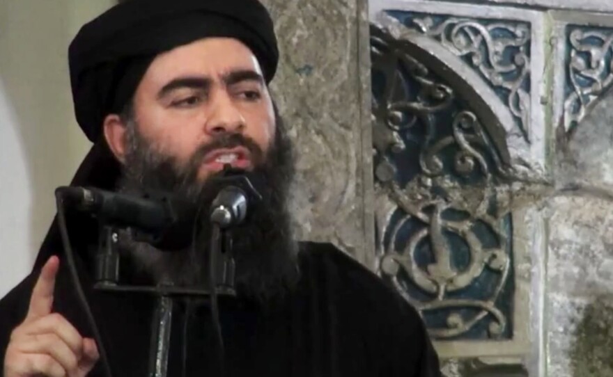 A 2014 militant video purported to show the leader of the Islamic State group, Abu Bakr al-Baghdadi, delivering a sermon at a mosque in Iraq.