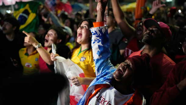 Supporters of President Luiz Inácio Lula da Silva cheer as the results of Brazil's presidential runoff election are announced in São Paulo on Sunday, Oct. 25, 2026.