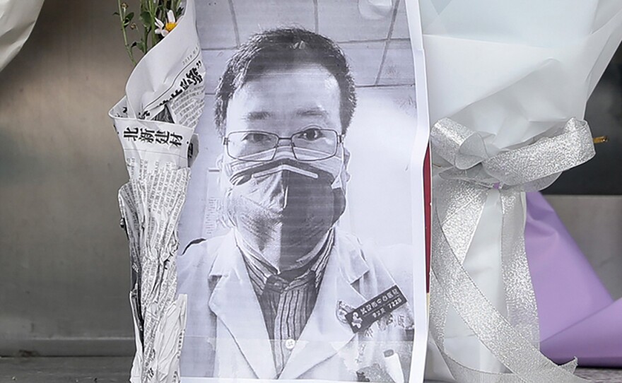 A photo of the late ophthalmologist Li Wenliang at a hospital in Wuhan, China, on Friday. Li, who is being hailed for his efforts to alert the medical profession to the new virus, died Friday after becoming infected.