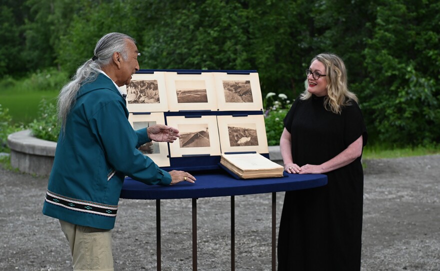 Aimee Pfielger (right) appraises a 1930 Edward Curtis <i>The North American Indian</i> vol. 20, in Anchorage, Alaska. ANTIQUES ROADSHOW “Alaska Native Heritage Center, Hour 1” premieres Monday, January 8 at 8/7C PM on PBS. 