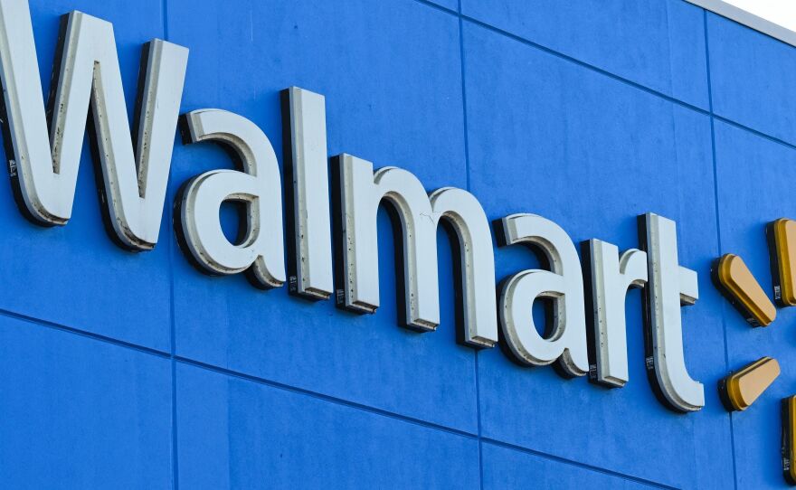 A Black man in Portland, Ore., has been awarded $4.4 million in a settlement after a jury determined he was racially profiled while shopping at Walmart. Here, the Walmart logo is seen outside a store in Burbank, Calif.