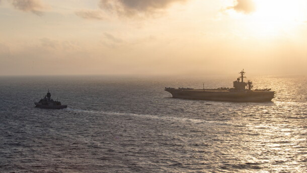 Royal Australian Navy frigate HMAS Perth sails alongside the aircraft carrier USS George Washington in the South China Sea, Aug. 11, 2026.