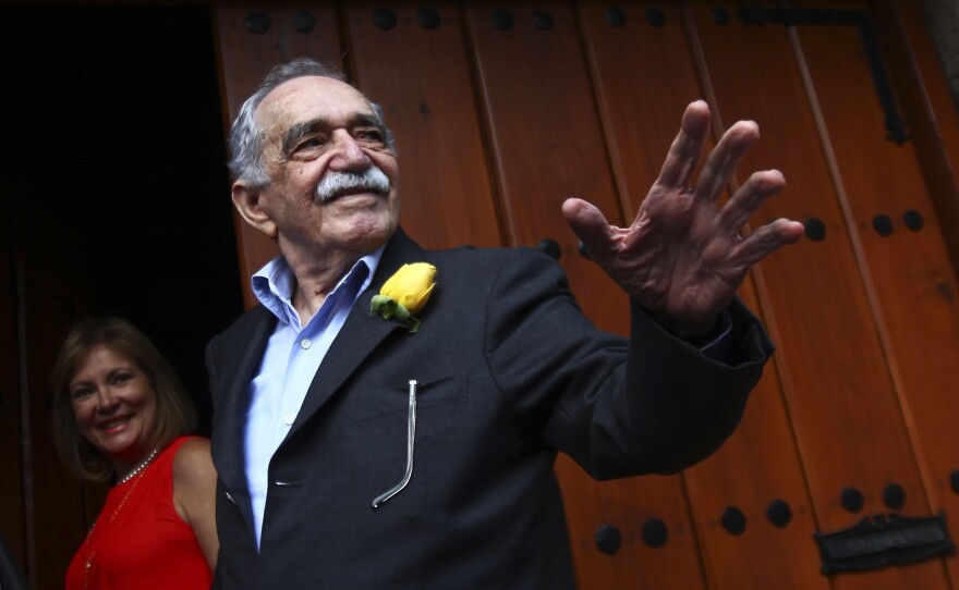 Gabriel García Márquez greets journalists and neighbors on his birthday outside his house in Mexico City on March 6, 2014.