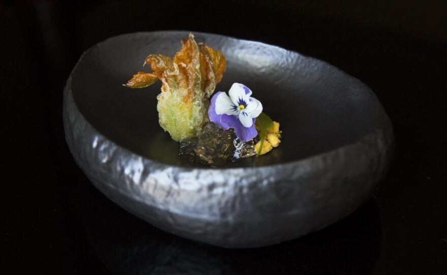 Blue crab, zucchini blossom and carrot served at N/Naka. The waiting list for Nakayama's restaurant is three months long, and it's not inexpensive. For nearly $200 each, diners can enjoy a 13-course, artfully plated culinary experience.