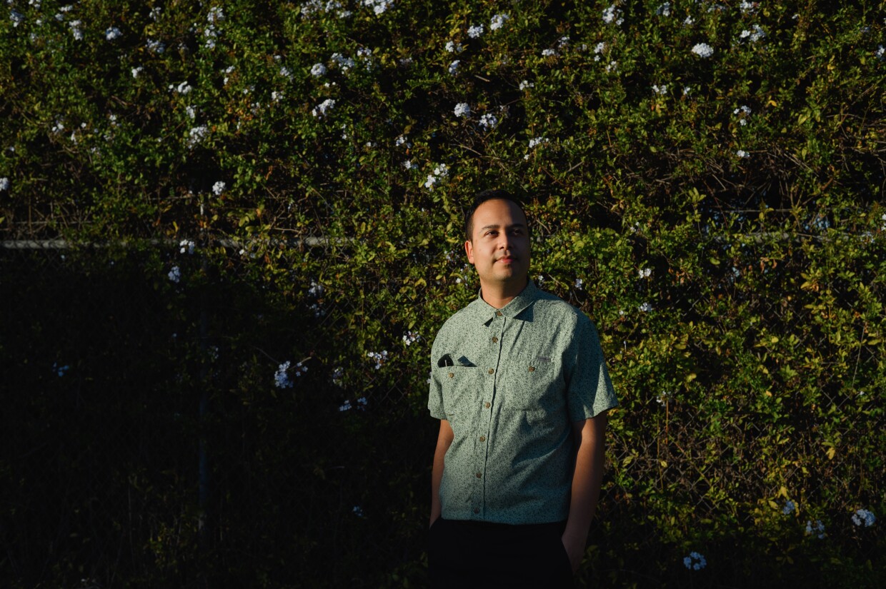 GIS Researcher Jacob Helfman stands for a portrait near his family’s home in West Chula Vista on Dec. 14, 2023. Helfman recently created new maps that show the extent of the parks and open space divide between Chula Vista’s East and Westside.