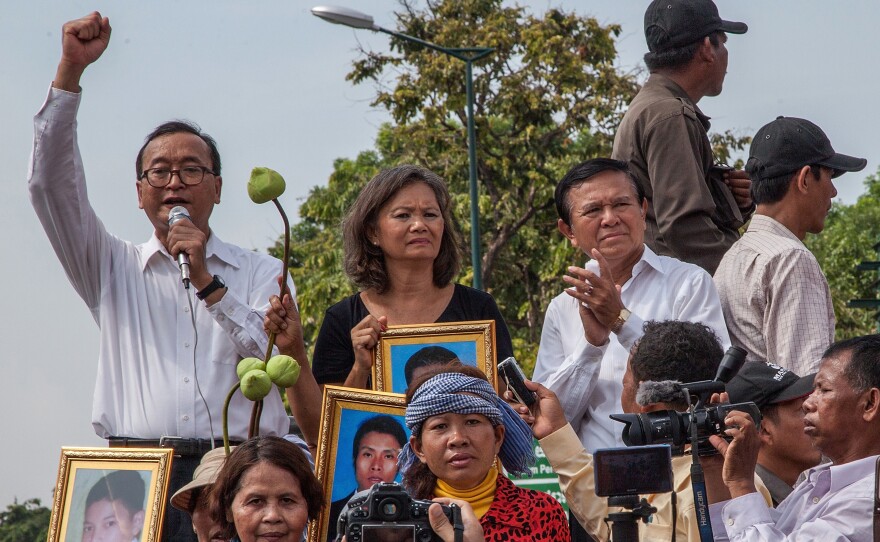 Leaders of the opposition Cambodia National Rescue Party, (from left) Sam Rainsy, Mu Sochua and Kem Sokha, give speeches in Phnom Penh in 2014. Rainsy and Sochua now live in self-imposed exile outside the country, while Sokha has been jailed since 2017.
