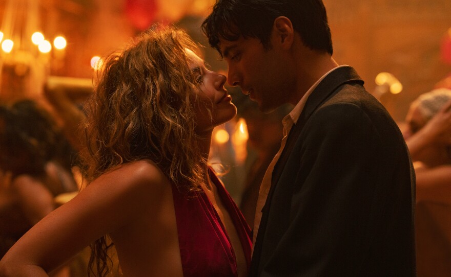 Margot Robbie as Nellie LaRoy and Diego Calva as Manny Torres in <em>Babylon.</em>