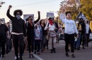 Protesters march down Vine Street in Lakeside expressing their anger over the stabbing of a teenage black girl by a 16-year-old white boy in an apparent hate crime, April 23, 2022.