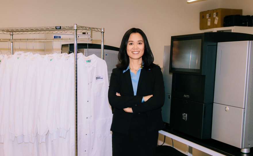 CEO Molly He of Element Biosciences stands beside the company's AVITI gene and cellular scanning device.  July 28, 2025