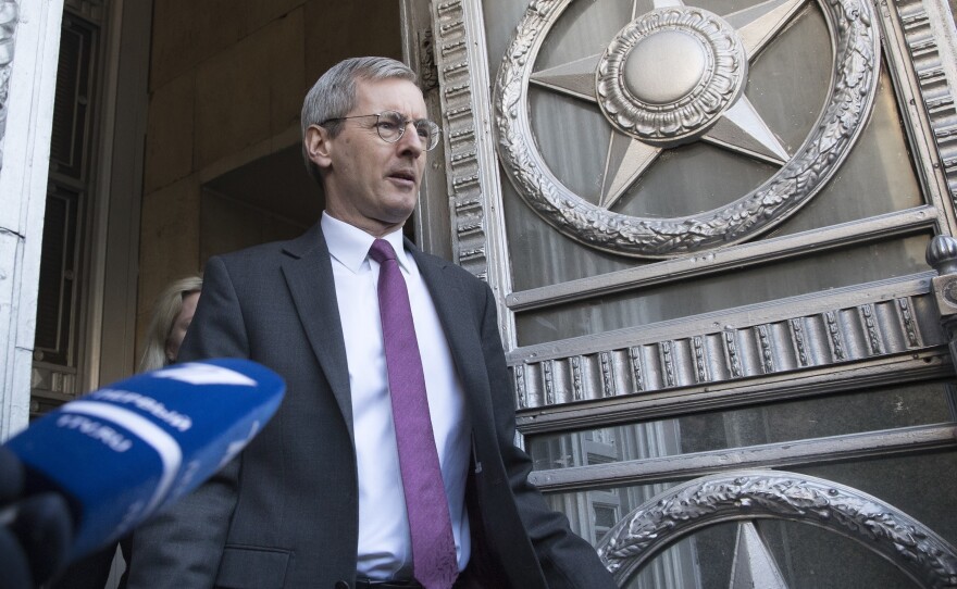British ambassador to Russia, Laurie Bristow, leaves after a meeting at the Russian foreign ministry building in Moscow on Saturday. Russia says it's expelling 23 U.K. diplomats.