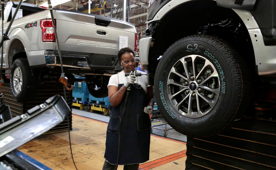 A Ford F-150 pickup is assembled at a plant in Dearborn, Mich., on Sept. 27. The economy expanded at a 3.5 percent rate in the third quarter.