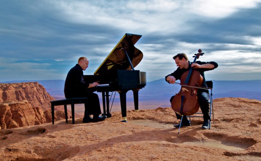 YouTube sensation ThePianoGuys, featuring Steven Sharp Nelson on cello and Jon Schmidt on piano, perform at a stunning outdoor venue in Salt Lake City, Utah.