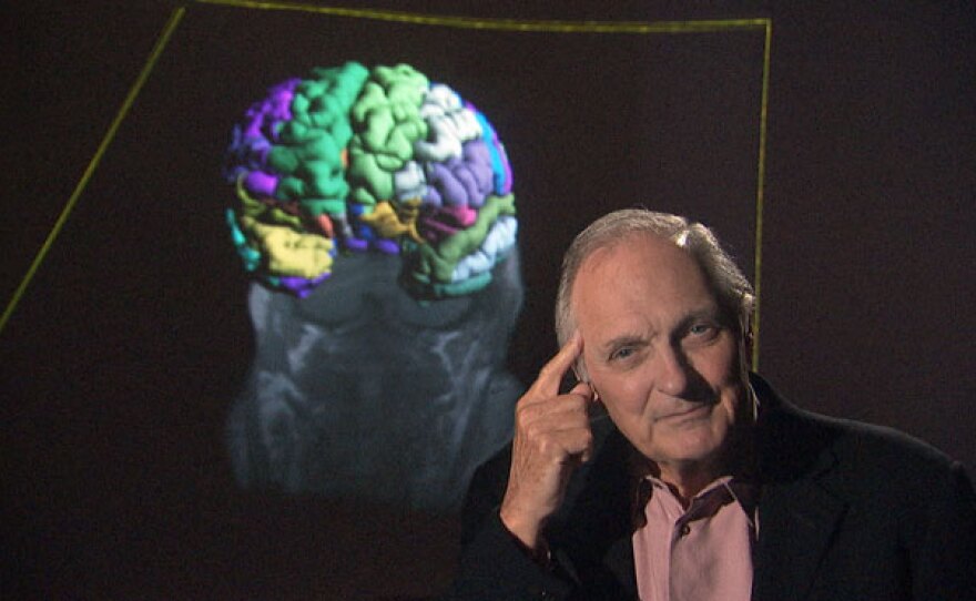 Host and narrator Alan Alda poses in front of his brain scan at the University of Oregon. This three-part series explores what makes us human.