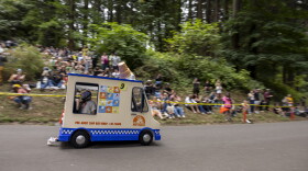 Racers a few moments after the start of the derby at Mt. Tabor Park during the 27th Portland Adult Soap Box Derby on Aug. 15 in Portland, Ore.
