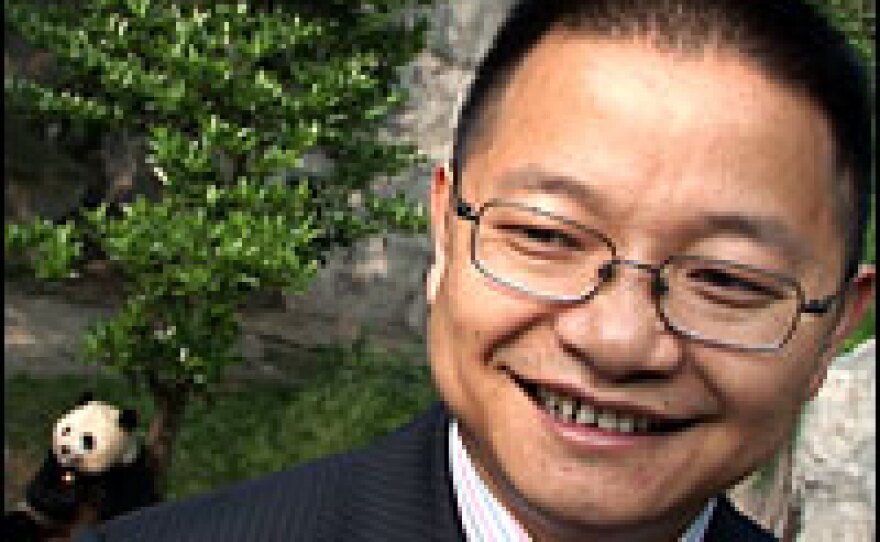 Zhang Zhihe, 42, has been director of the Chengdu panda research center for six years.