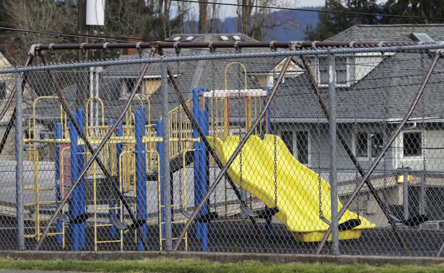 The playground at Lowell Elementary School in Tacoma, Wash., sat empty on Tuesday. According to Tacoma Public Schools, Lowell was closed after someone at the school tested presumptive positive for the novel coronavirus.