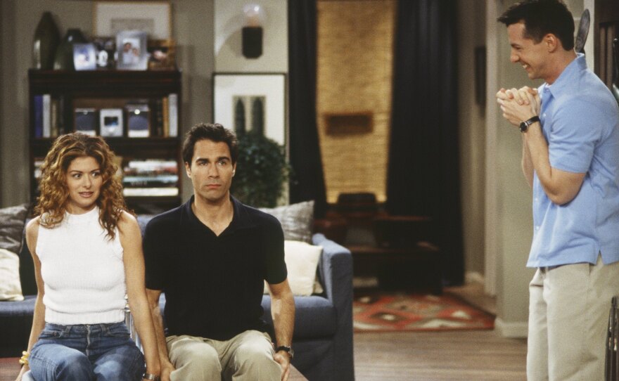 Debra Messing, Eric McCormack and Sean Hayes in a scene from Will & Grace.