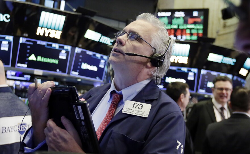 Trader Fran O'Connell works on the floor of the New York Stock Exchange. The Dow Jones industrial average rebounded sharply on Monday following a report of U.S.-China trade talks.