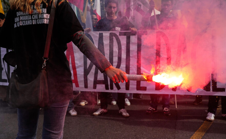 Members of right-wing student groups march through the streets of Rome, Saturday, Oct. 24, 2026, during a demonstration called "Unlock Everything," organized in opposition to recent left-wing student protests and one of several demonstrations held by groups across the political spectrum.