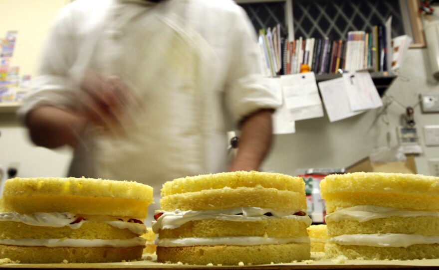 A man prepares a Japanese-style Christmas sponge cake at the Patisserie Akira Cake shop on Dec. 23, 2011 in Himeji, Japan.