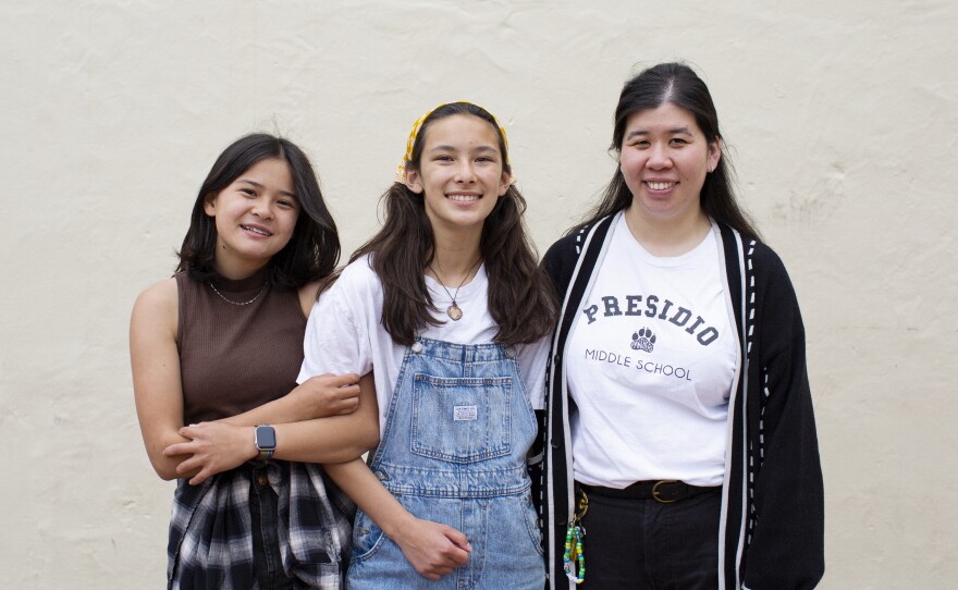 Winners of NPR's Student Podcast Challenge, Norah Weiner and Erika Young, with their teacher Jenny Chio, at Presidio Middle School in San Francisco.