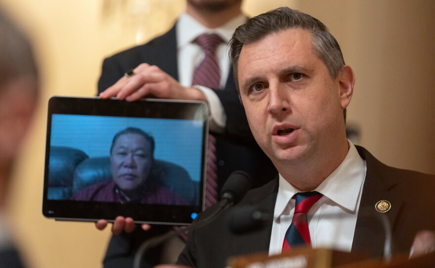 Rep. Seth Magaziner, D-R.I., speaks while joined on a video call by Sae Joon Park during a hearing of the House Committee on Homeland Security on Dec. 11, 2025.
