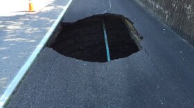 A large sinkhole on the right shoulder of eastbound Interstate 8 led to a partial closure of the freeway from Waring Road to College Avenue in San Diego.