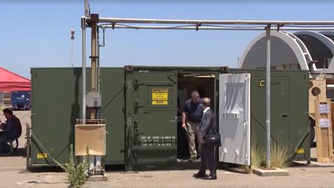 A 3D printer is contained in a metal box the size of a small shipping container is being used to produce parts for Naval operations. Aug. 5, 2025.
