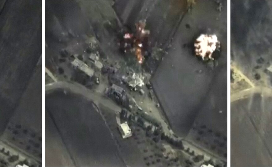A combination of images taken from footage released by Russia's Defense Ministry shows a mountainous area in Syria before, during and after an airstrike Wednesday. Russia is being criticized for attacking groups other than ISIS militants.