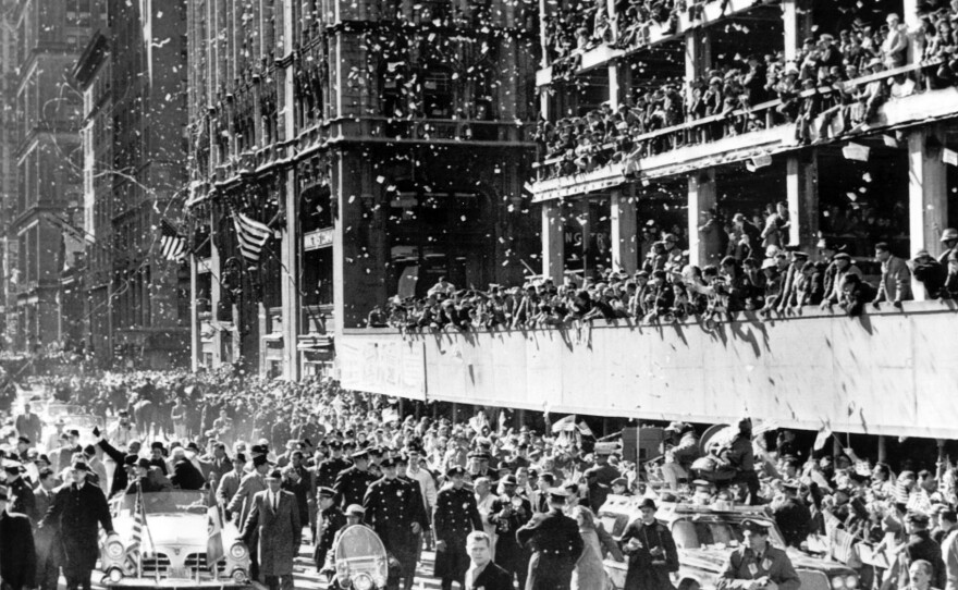 Glenn received a massive ticker-tape parade welcome along lower Broadway in New York on his way to a ceremony at City Hall on March 1, 1962.