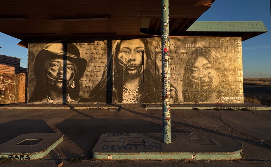 Thomas' 2026 installation at an abandoned gas station in Gray Mountain, Az. The painted handprints smeared on the subjects' faces symbolize of the high rates of domestic violence and murder among Native American women.