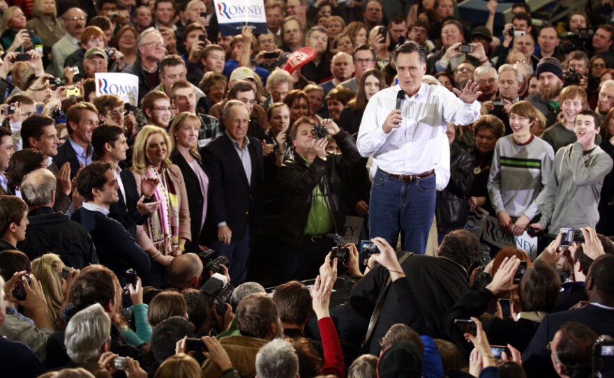 Former Massachusetts Gov. Mitt Romney appeared at a rally Monday in Clive, Iowa.