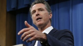 Gov. Gavin Newsom talks to reporters at his Capitol office, in Sacramento, Calif.,  July 23, 2019. 