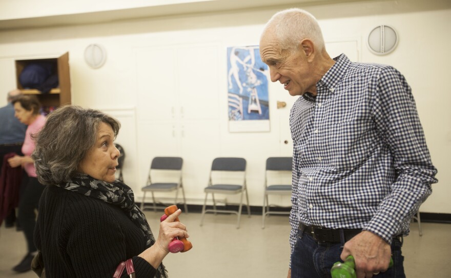 David chats with one of his students after his exercise class at the 92nd Street Y.