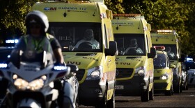 An ambulance transporting Miguel Pajares, a Spanish priest who was infected with the Ebola virus while working in Liberia, leaves the Military Air Base of Torrejon de Ardoz, near Madrid, Spain, Thursday, August 7, 2014. 