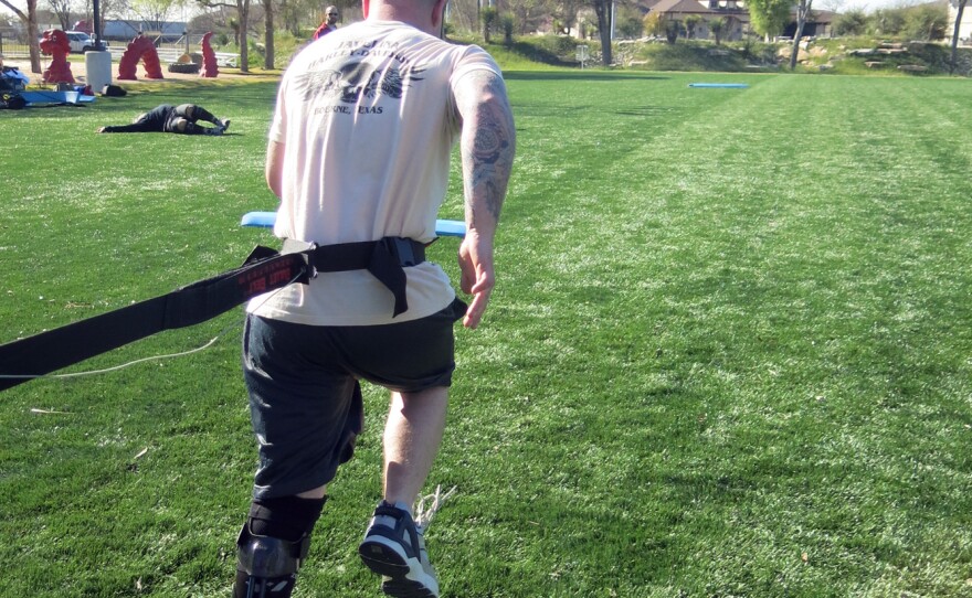 Army Spc. Joey McElroy practices resistance running with the IDEO. Soldiers who are fitted with the brace spend four weeks learning how to use it in a "Return to Run" program.
