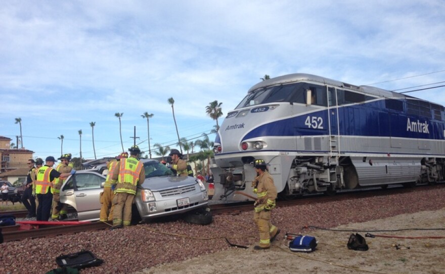 At the scene of a collision between an Amtrak train and car in Oceanside, March 16, 2015.